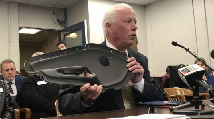 Flexform Technologies CEO Gregg Baumbaugh displays one of the automobile interior parts his company manufactures using hemp. - Brandon Smith/IPB News