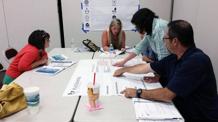 A group of residents participating in the Hometown Collaboration Initiatives brainstorm Orange County's placemaking needs. - Annie Ropeik / Indiana Public Broadcasting