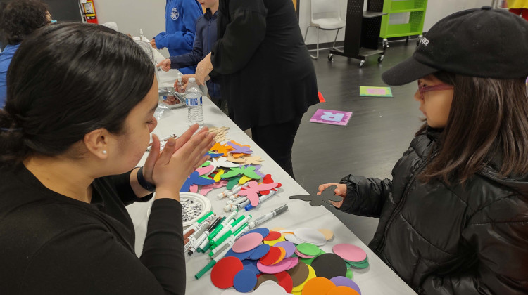 WFYI partnered with the Indianapolis Public Library to host “Growing Healthy Communities,” an event to share resources about lead testing and remediation. Kids participated in crafts and adults left with kits to test for lead at home. - Brittani Howell/WFYI