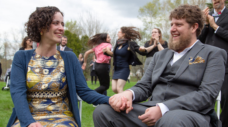 Liana Wolk (left) and Owen Marshall (right) at their wedding in May 2019. Marshall is one of an estimated 5 million Americans stuck in the "family glitch." - Submitted Photo