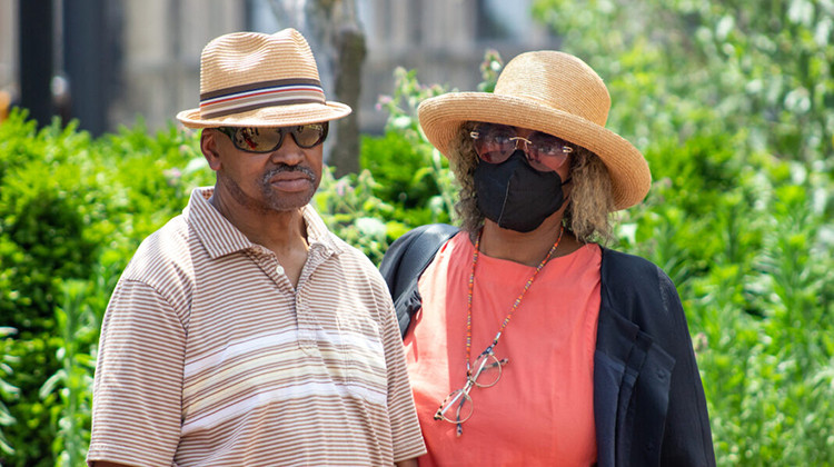 Herman Whitfield Jr. (left) and Gladys Whitfield (right) stand at a press conference July 1, 2022, outside of City Market. They are the parents of Herman Whitfield III, who died in police custody in April.  - Tyler Fenwick/Indianapolis Recorder