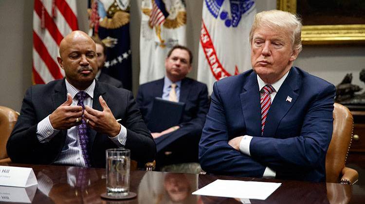 President Donald Trump listens as Indiana Attorney General Curtis Hill speaks during a meeting with state and local officials to discuss school safety in the Roosevelt Room of the White House, Thursday, Feb. 22, 2018, in Washington. - AP Photo/Evan Vucci