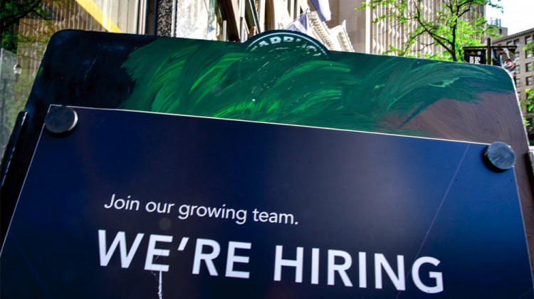 A poster board for a Starbucks in Indianapolis advertising a job opening. - Justin Hicks/IPB News