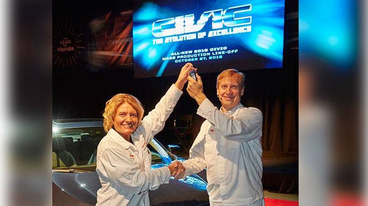 Honda Manufacturing of Indiana Vehicle Quality Department associate Michelle Christianson (left) hands HMIN President Bob Nelson the key to the all-new 2016 Honda Civic sedan at the line-off ceremony today in Greensburg, Indiana. - Honda Manufacturing of Indiana