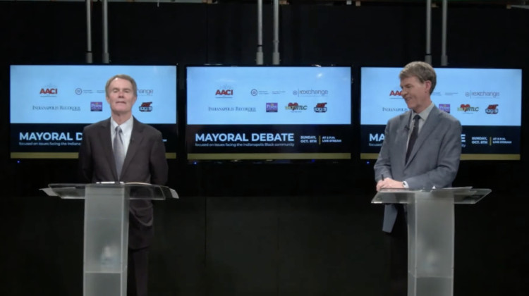 The candidates for Indianapolis mayor, incumbent Democrat Joe Hogsett, left, and Republican challenger Jefferson Shreve, give opening remarks in their first debate on Sunday, Oct. 8, 2023. - Indianapolis Recorder/YouTube