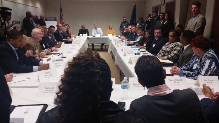 Gov. Eric Holcomb listens to residents and community leaders address some of their concerns with the lead contamination in East Chicago, Indiana. (Lauren Chapman/IPB News) - Lauren Chapman/IPB