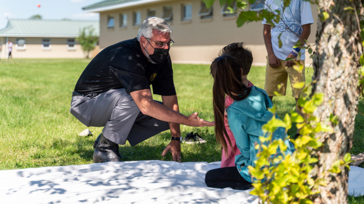 Gov. Eric Holcomb visited evacuees earlier this month at Camp Atterbury. - Gov. Eric Holcomb/Twitter