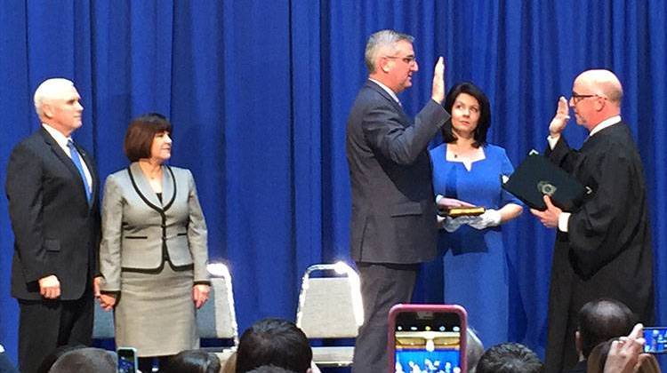 Eric Holcomb is sworn in as lieutenant governor by Indiana Supreme Court Justice Mark Massa  - AP Photo/Michael Conroy