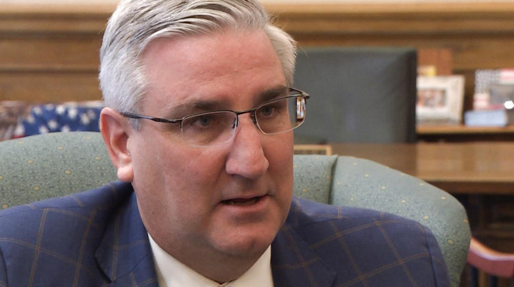 Gov. Eric Holcomb says he wants to know more about the ways school money gets to teachers salaries before adding even more dollars to the mix.  - (Zach Herndon/WTIU)