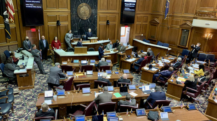 Lawmakers on the Indiana House floor debate a bill to further restrict vote-by-mail.  - Brandon Smith/IPB News