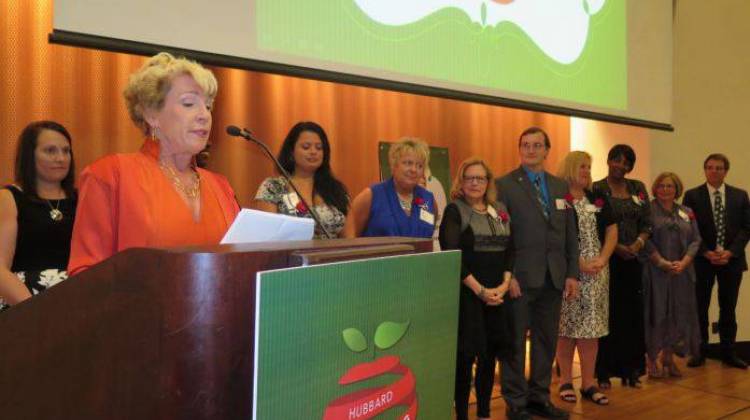 Kathy Hubbard with the honored teachers at last year's Hubbard Life-Changing Teacher Awards ceremony. - Scott Elliott / Chalkbeat Indiana