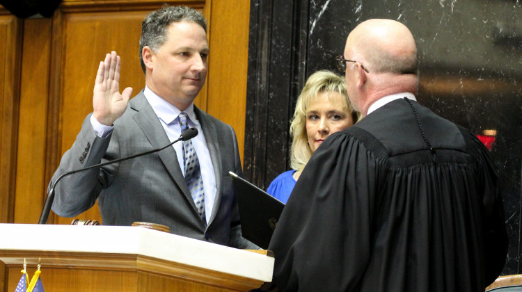 Speaker Todd Huston (R-Fishers) sworn in by Supreme Court Justice Mark Massa. - Lauren Chapman/IPB News