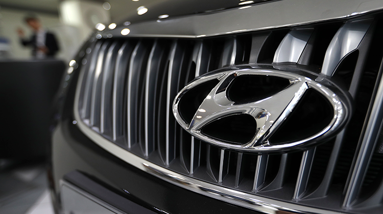 The logo of Hyundai Motor Co. is seen on a car displayed at the automaker's showroom in Seoul, South Korea, Wednesday, Oct. 26, 2016.  - AP Photo/Lee Jin-man