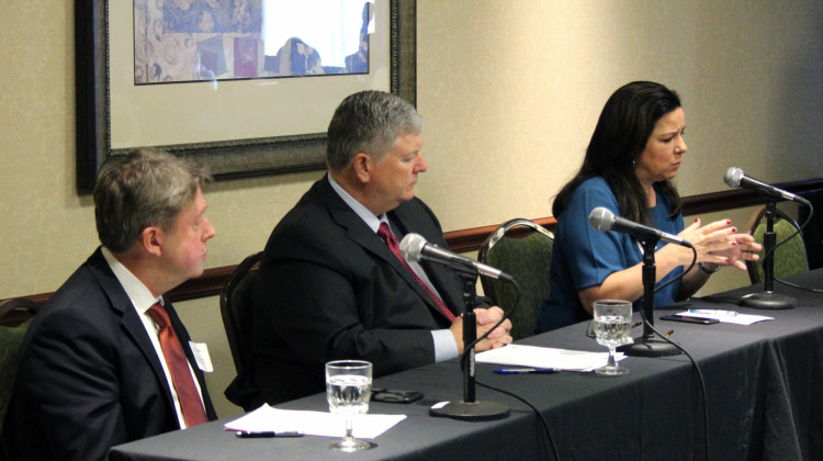 (From left) Indiana Small Business Development Center Export Advisor Andrew Reinke; Public Policy, Motor & Equipment Manufacturers Association Vice President Tom Lehner; and World Trade Center Indianapolis President Doris Anne Sadler speak on a panel. - Samantha Horton/IPB News