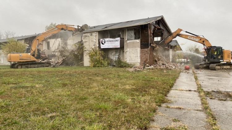 Demolition began on the vacant Oaktree Apartments on the city's far east side. The apartments have become a hot spot for crime.  - Darian Benson/WFYI