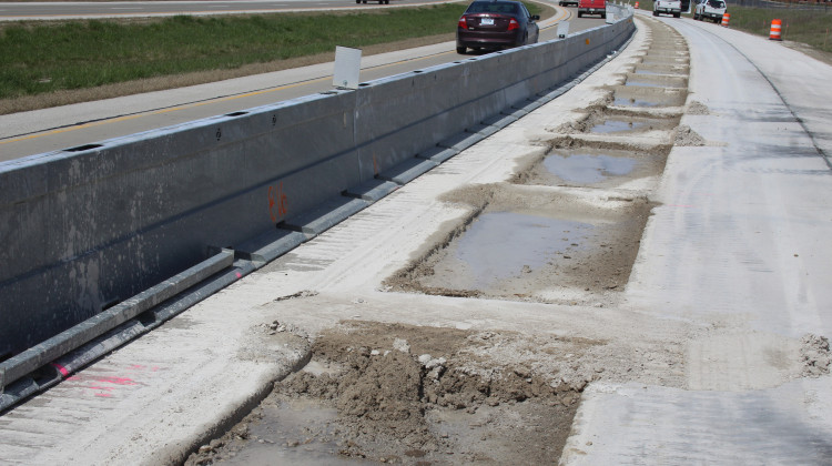 These rectangular holes will eventually be embedded with the cable system designed in Purdue’s lab to charge semi-trucks. - WFYI / Ben Thorp