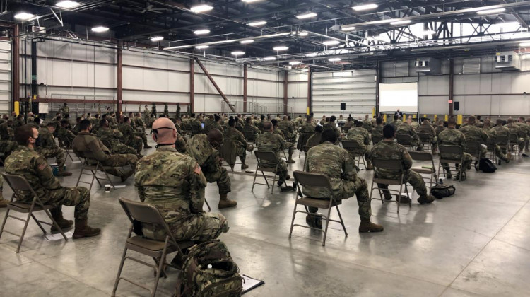 Members of the National Guard receive instructions ahead of their deployments to Indiana nursing homes last fall.  - (Brock E.W. Turner, WTIU/WFIU News)