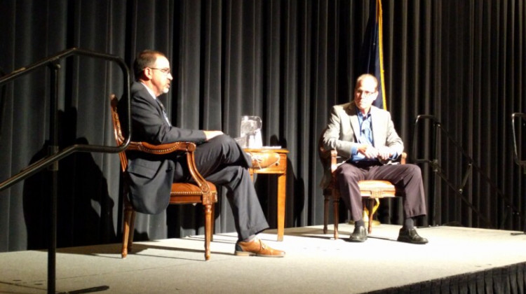 U.S. Sen. Mike Braun (R-Ind.), right, speaks to the Muncie-Delaware County Chamber of Commerce. - Stephanie Wiechmann/Indiana Public Radio