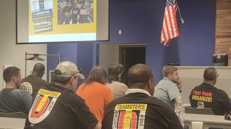 A group of union workers from UPS facilities across Indiana and neighboring states listen as organizers present on the contract negotiation process.  - Adam Yahya Rayes/IPB News
