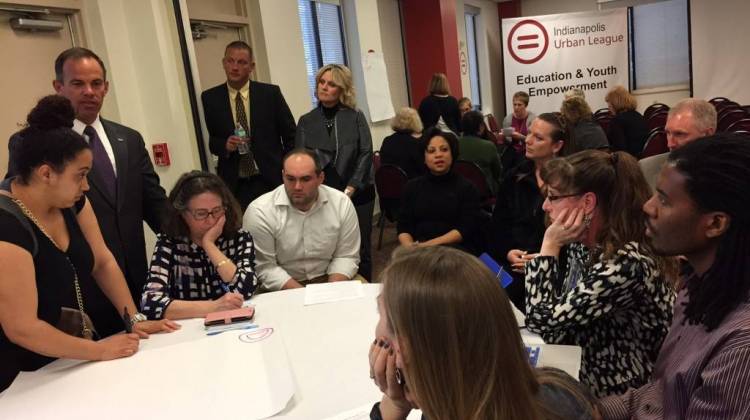 Superintendent of Public Instruction Jennifer McCormick, center, listens as educators discuss ways to help failing schools during a ESSA Community Meeting on Tuesday April 4, 2017 at the Indianapolis Urban League. State Board of Education member B.J. Watts, and Wayne Township Schools Superintendent Jeff Butts also listen. - Eric Weddle/WFYI