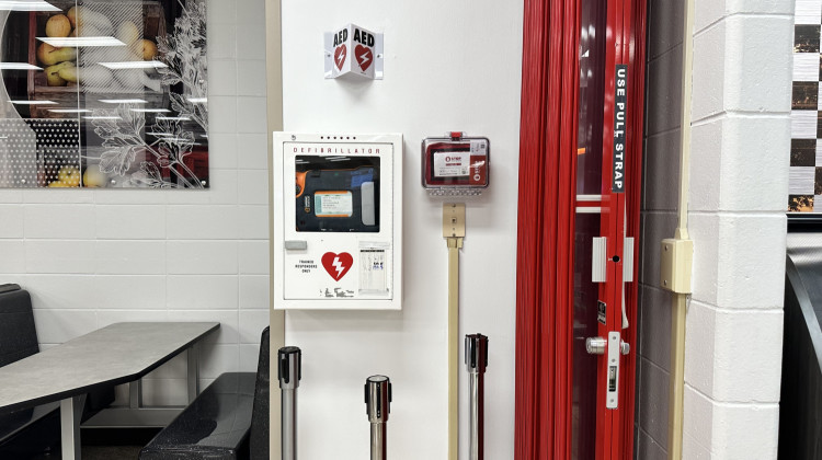 An AED is a device that sends a shock to the heart of someone going through a sudden cardiac arrest to try and revive a heartbeat. It can be life saving. - Alex Li/Side Effects Public Media