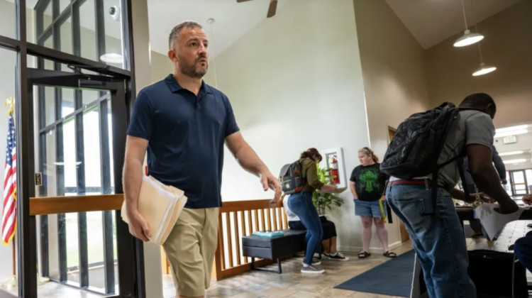 Dennis Brackenridge arrives to the Perry Township Small Claims Court where he has filed eviction notices against a number of residents at Francis Apartments. The court heard eviction cases involving residents of Francis Apartments on May 2, 2025. - Doug McSchooler / Mirror Indy