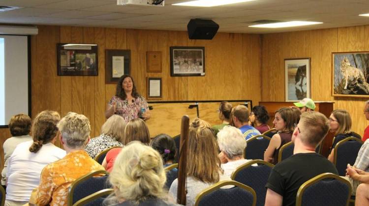 Prof. Linda Prokopy speaks to a crowd at Wolf Park about why people have the attitude they do toward climate change. - Charlotte Tuggle/WBAA