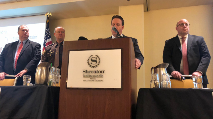 Mike Snowden, executive director of communications for Hamilton County; Hamilton County Sheriff Mark Bowen, Hamilton County Board of Commissioners President Mark Heirbrandt; and Emergency Management Executive Director Shane Booker spoke on the panel. - Carter Barrett/WFYI