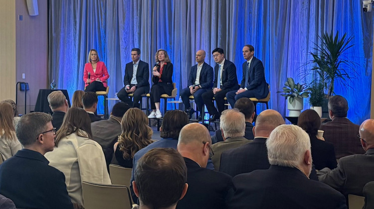 Industry and education leaders joined a panel at Elanco recently.  - Jill Sheridan / WFYI