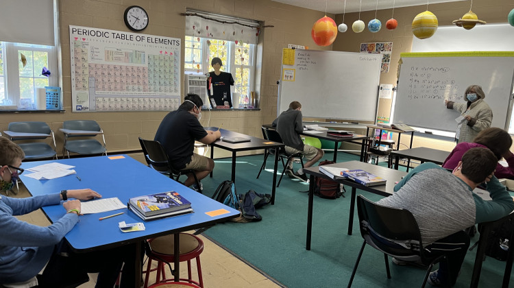 Cindy Davies teaches integrated chemistry and physics to a group of students at the Independence Academy in Indianapolis. - (Lee V. Gaines/WFYI)