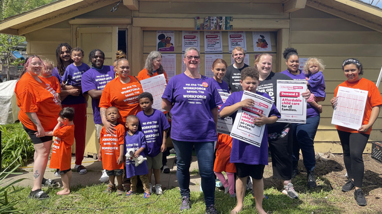 Child care advocates at a strike on May 9 donned shirts that read, "We are the workforce behind the workforce." They're advocating for racial justice, equitable access and living wages. - Sydney Dauphinais/WFYI