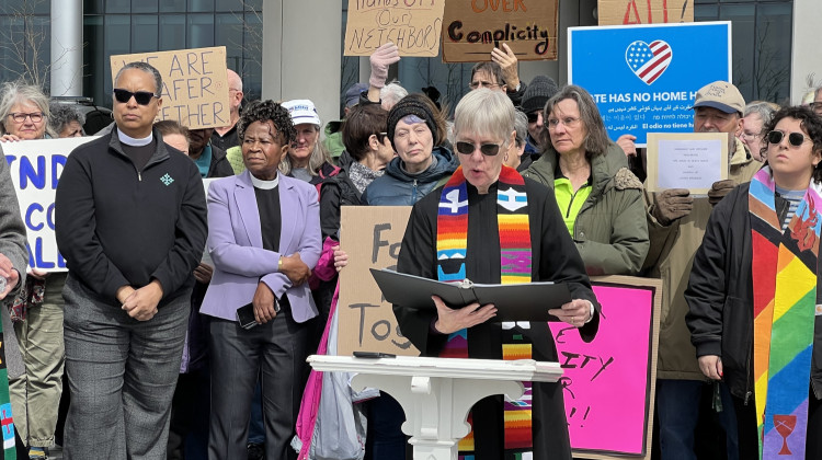 Rev. Carolyn Higginbotham speaks at a gathering of faith leaders and supporters at the Community Justice Center. - Zach Bundy / WFYI