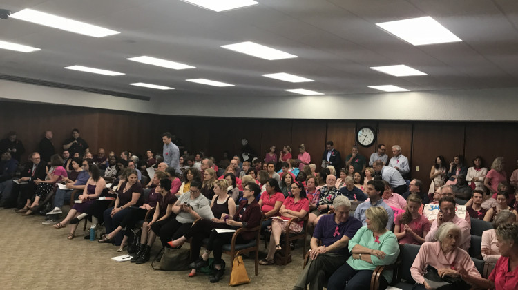 Pro-life and pro-choice supporters wait for the South Bend Common Council meeting to begin on Monday.  - Barb Anguiano/WVPE