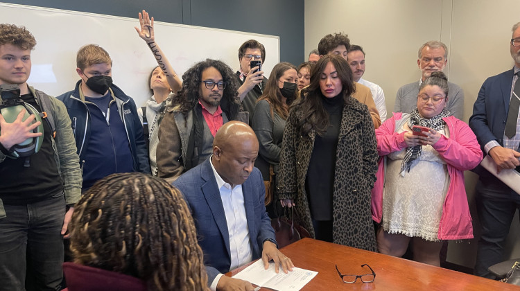 Dozens of parents and community members showed up to the City-Council building on Tuesday in support of Jesse Brown, a city-councilor removed from the Democratic caucus. City-County Council president Vop Osili did not answer questions about the vote. - Sydney Dauphinais / WFYI