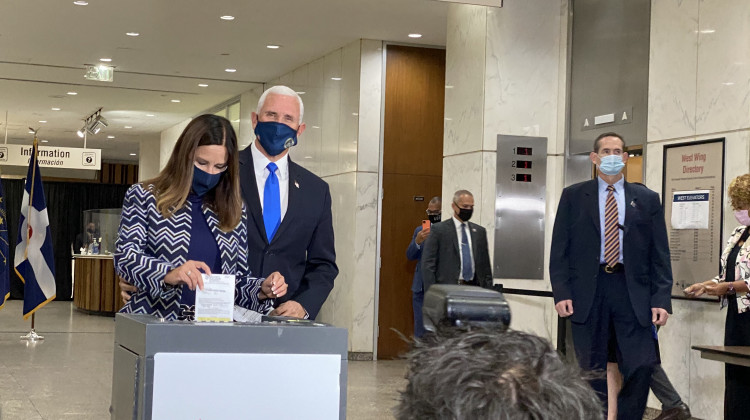 Vice President Mike Pence and wife Karen pence cast absentee ballots in Indianapolis Friday.  - Darian Benson/WFYI