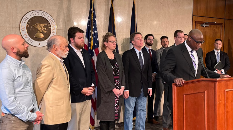 Local leaders and legal representatives announce lawsuits against landlords who manage three apartment properties across the city. The suits seek to make landlords pay for back utilities owed.  - Jill Sheridan/WFYI