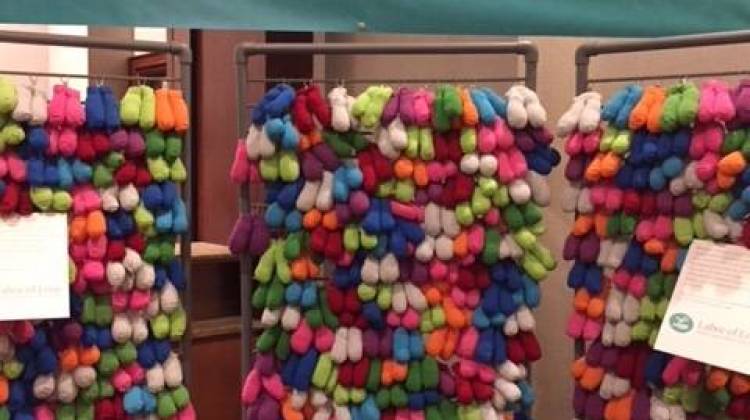 A display at the Indiana Labor of Love summit, each pair of booties represents a Hoosier child who died before their first birthday. - Jill Sheridan/IPB News