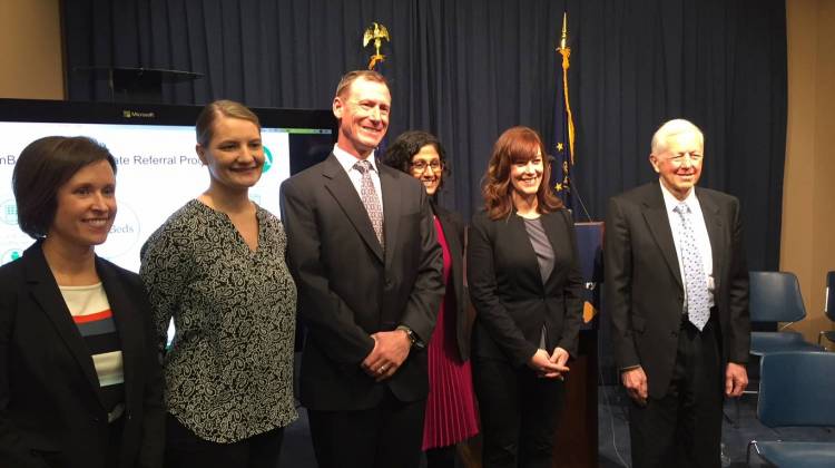 Indiana FSSA, Indiana 2-1-1 and Open Beds representatives announce a new partnership. - Jill Sheridan/IPB News