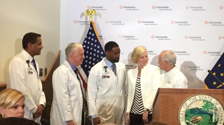 Community Health leaders join state officials for an announcement about the neonatal program. - Jill Sheridan/IPB News