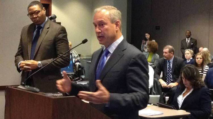 Jonathan Hage, Charter Schools USA CEO, talks to the State Board of Education on Wednesday, Feb. 4, 2015 at the Indiana Government Center, while Indianapolis Public Schools Superintendent Lewis Ferebee listens. - Eric Weddle / WFYI Public Media