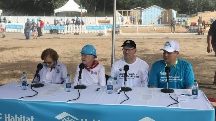 Rosalynn Carter, President Jimmy Carter, Habitat for Humanity International CEO, Jonathan Reckford, and Habitat for Humanity of St. Joseph County CEO, Jim Williams answer questions during a Monday morning press conference at the build site of the 2018 Jimmy and Rosalynn Carter Works Project in Mishawka. - Barb Anguiano/WVPE