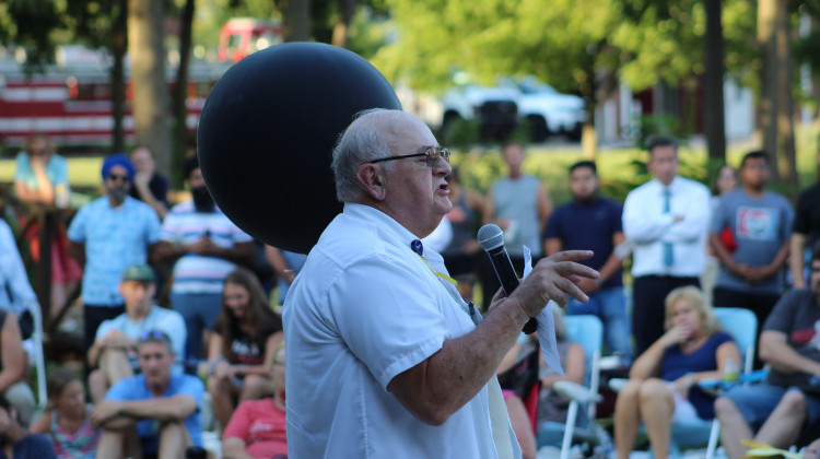 Chaplain David Owens addresses people gathered for the vigil Friday night  - Ben Thorp