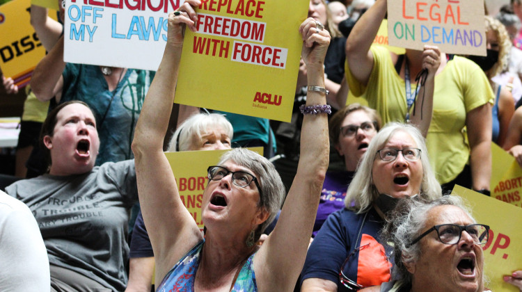 Protesters gathered at the Statehouse Monday in opposition to a total abortion ban – with limited exceptions – proposed by Indiana lawmakers. - Ben Thorp/WBAA