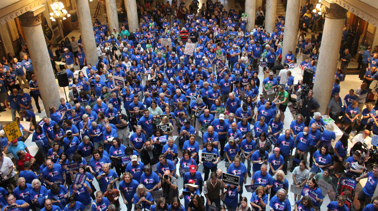 Hundreds gathered at that Statehouse for the “Love Them Both” anti-abortion rally organized by Indiana Right to Life. The group urged lawmakers to restrict abortion and increase support for pregnant Hoosiers and children. - Emilie Syberg / WFYI