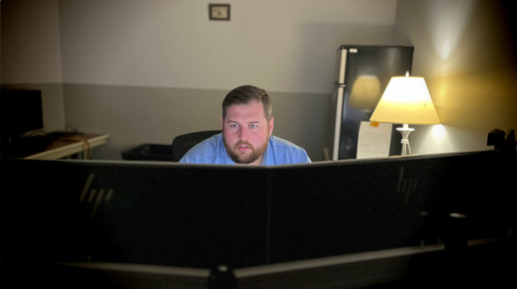 Matt Ashley, a senior IT technologist at Johnson Memorial Health in Franklin, Indiana, is part of a small team that has been working for months after the cyberattack. His office is lined with dead computer screens and CPUs that his team has had to thoroughly inspect to make sure there is no malware the hackers might have left behind. - Farah Yousry / Side Effects Public Media