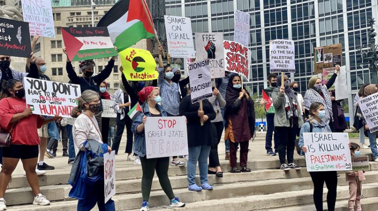 More than 50 people gathered in Indianapolis Tuesday to demand US officials stop funding Israel’s military and pressure the country to end airstrikes in Gaza.  - Darian Benson/IPB News