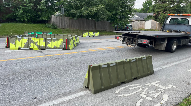 Barriers along 10th are part of tactical urbanism project. (Jill Sheridan/WFYI)