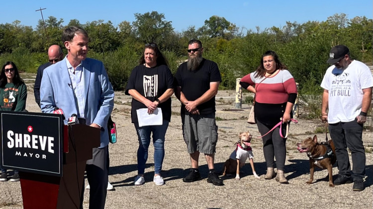 Jefferson Shreve stands with animal advocates near the site of a new planned animal shelter. (Jill Sheridan WFYI)