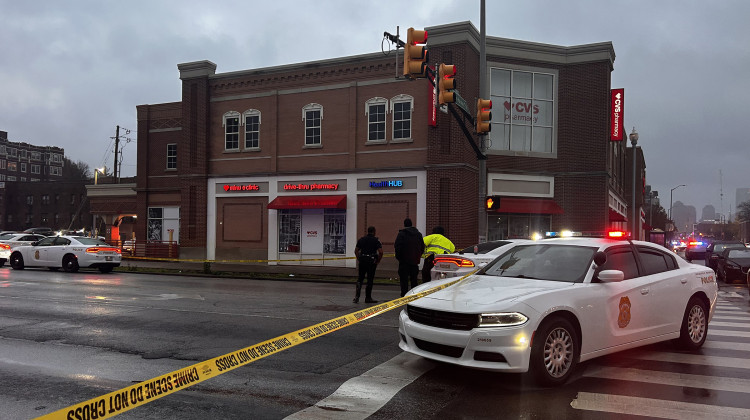 An officer shot a driver after another officer was struck by a vehicle in the 1500 block of North Meridian on Thursday, Nov. 14, 2024. - Eric Weddle / WFYI