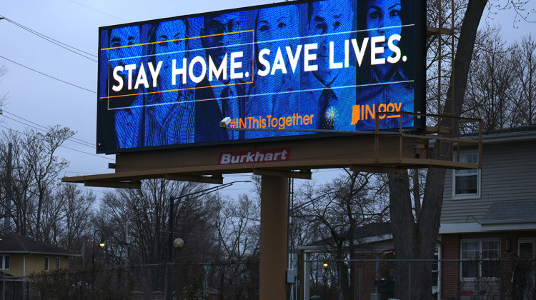 An electronic billboard in South Bend reads "Stay Home. Save Lives" as part of the state's INThisTogether campaign.  - Justin Hicks/IPB News